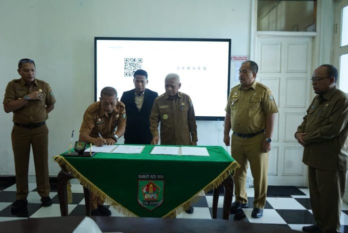 Pemerintah Daerah Dengan Bawaslu Asahan Melakukan Penandatanganan NPHD