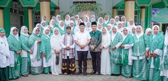 Bupati Zahir Hadiri Pelantikan Pengurus Ranting Muslimat Al Washliyah Simpang Gambus