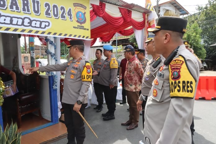 KAPOLRES PEMATANG SIANTAR DAMPINGI KAPOLDA SUMUT CEK POS PENGAMANAN IV JL SUDIRMAN