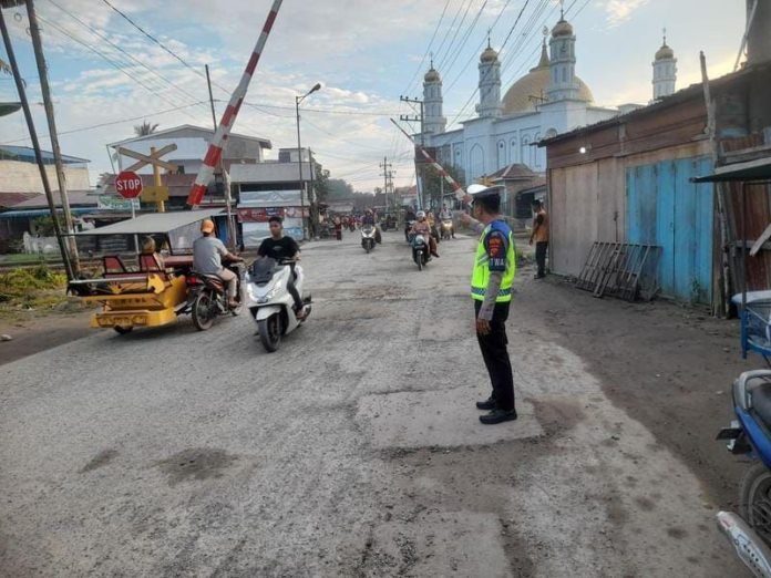 Personil Lantas Polres Tanjungbalai Amankan Arus Lalin Jalan Rawan Macet