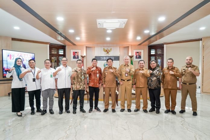 Pj Gubsu Hassanudin Terima Kunjungan Zainudin Direktur Kepesertaan BPJS Ketenagakerjaan