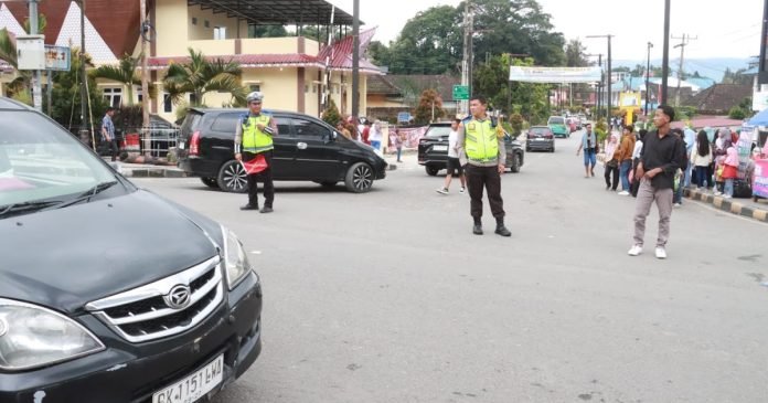 Polres Simalungun Imbau Jaga Kamseltibcarlantas di Pantai Bebas Parapat