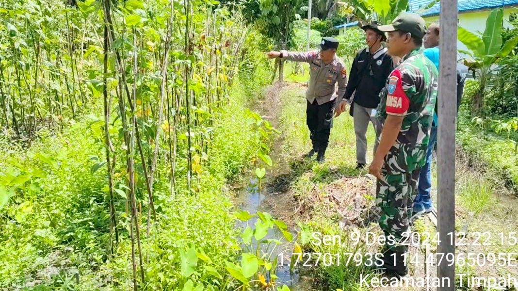 Polsek Timpah Melaksanakan Pengecekan Pemanfaatan Lahan Pekarangan Warga Desa Timpah